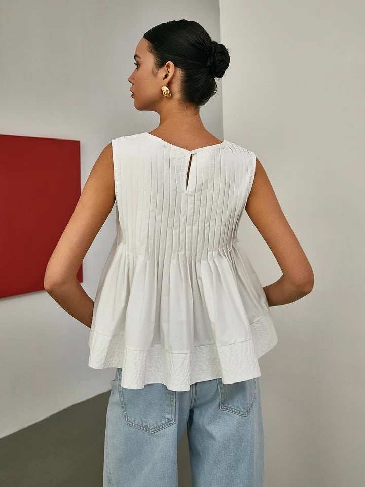 Blusa sin mangas con volantes plisados