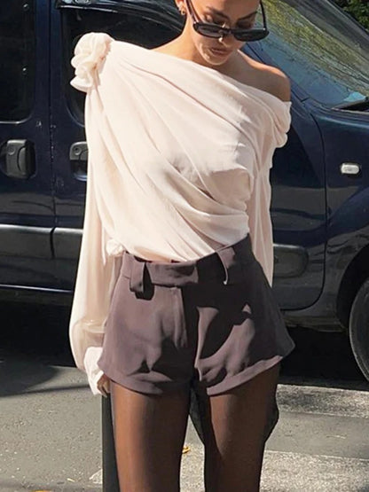 Blusa asimétrica de un solo hombro, semitransparente de gasa