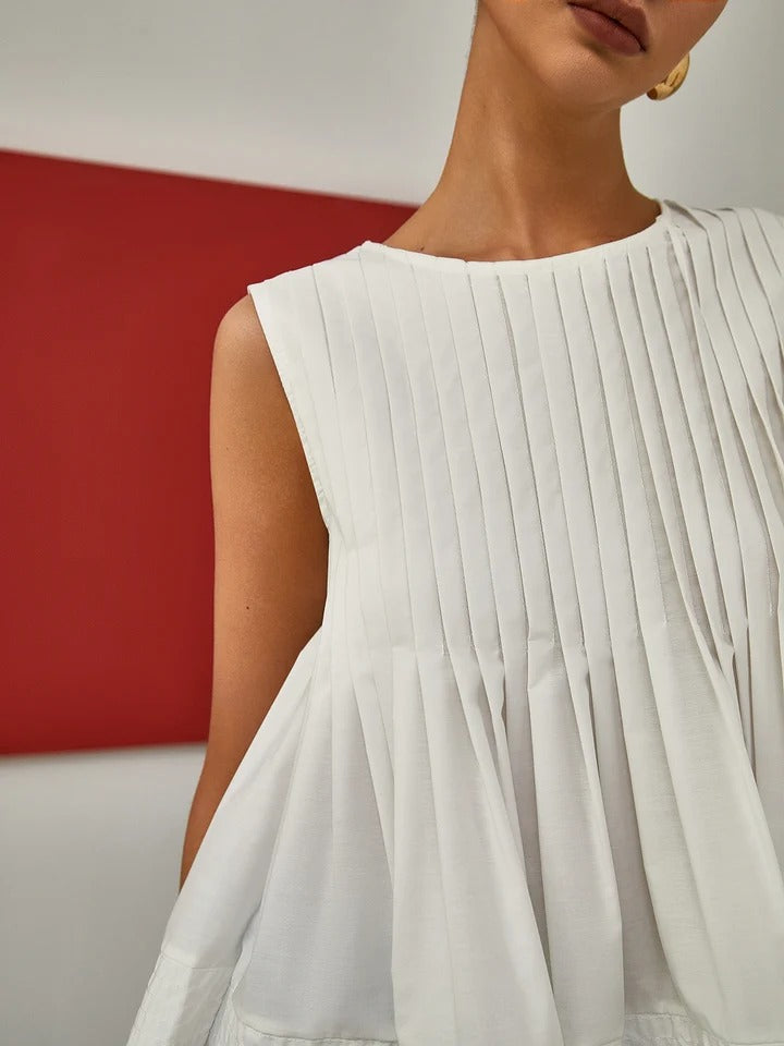 Blusa sin mangas con volantes plisados