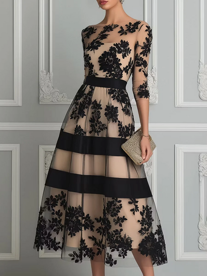 Elegante vestido midi de encaje negro