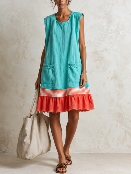 Katia | Vestido túnica azul claro sin mangas con raya roja y bajo con volantes