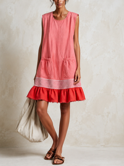 Katia | Vestido túnica azul claro sin mangas con raya roja y bajo con volantes