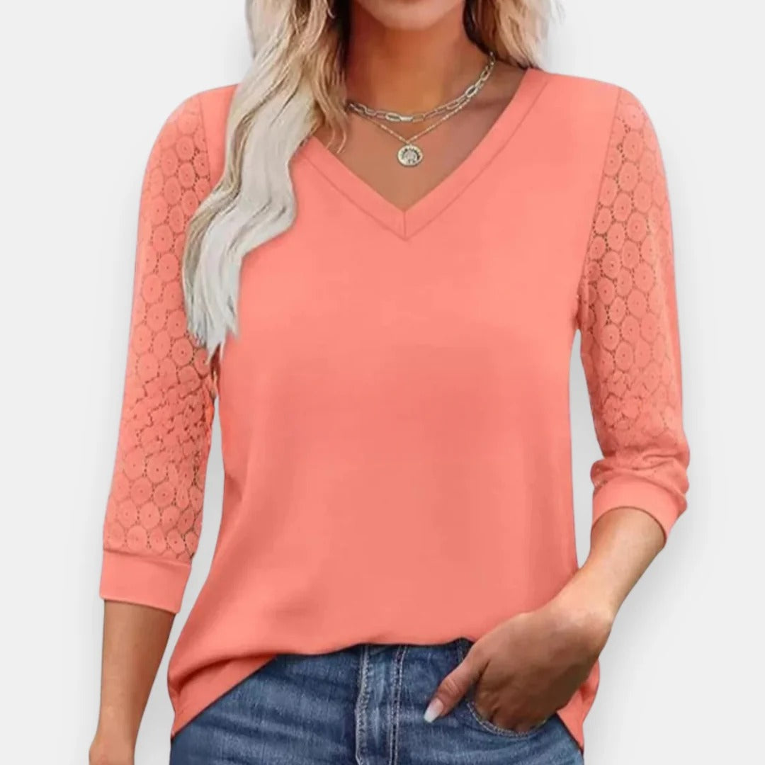 Blusa con mangas de encaje