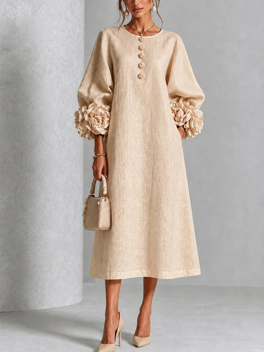 Vestido midi beige con estampado floral, botones y mangas florales extravagantes.