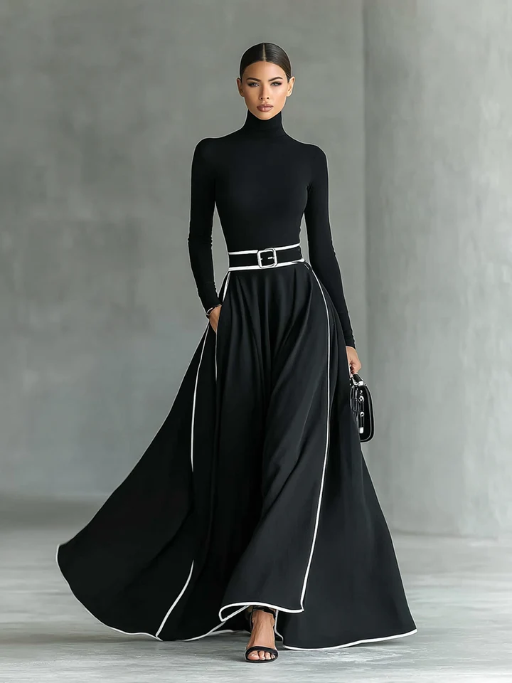 Vestido largo negro para mujer con costuras blancas, cuello alto, mangas largas y cintura ajustada.