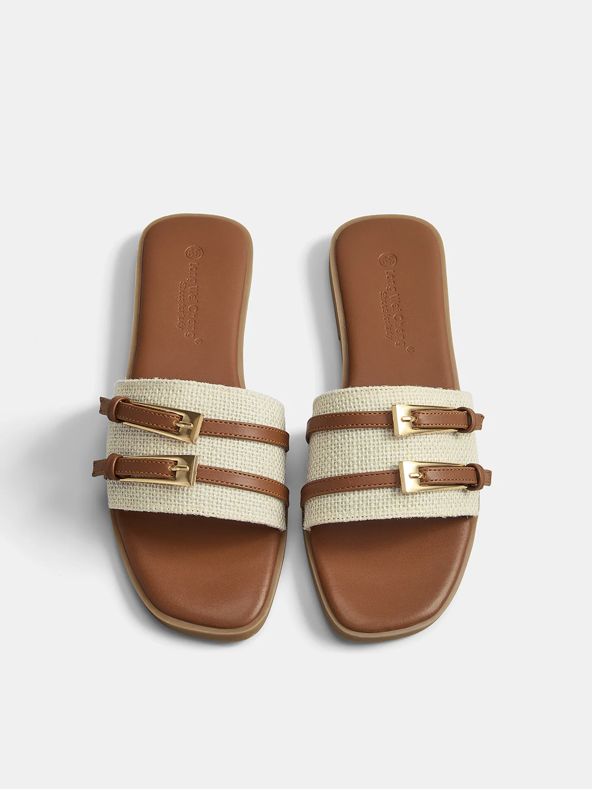 Sandalias planas con doble hebilla